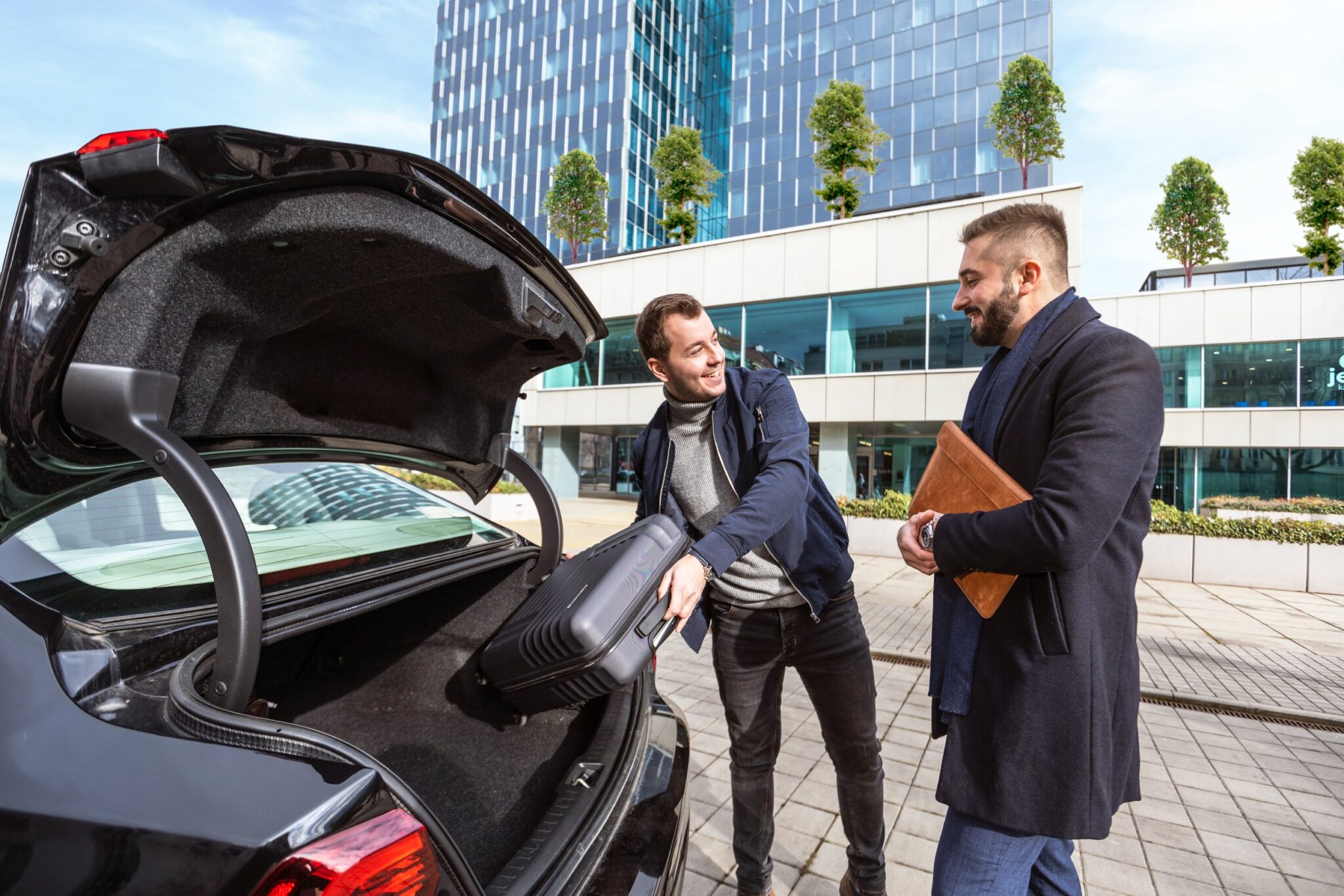 Two men with car